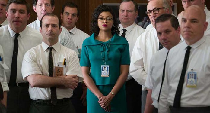 Katherine G. Johnson (Taraji P. Henson), stands out amid her team of fellow mathematicians that helped send into orbit John Glenn. Photo Credit: Hopper Stone.