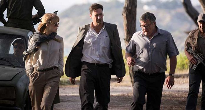 (l-­‐r) Rosamund Pike stars as Sandy Crowder, Jon Hamm as Mason Skiles and Dean Norris as Donald Gaines in BEIRUT, a Bleecker Street release. Credit: Sife Eddine El Amine / Bleecker Street