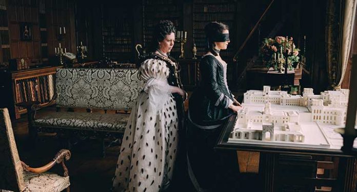 Olivia Colman and Rachel Weisz in the film THE FAVOURITE. Photo by Atsushi Nishijima. © 2018 Twentieth Century Fox Film Corporation All Rights Reserved