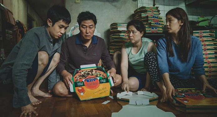 The Kim Family (Woo-sik Choi, Kang-ho Song, Hye-jin Jang, So-dam Park) in Parasite (2019). Courtesy of NEON CJ Entertainment