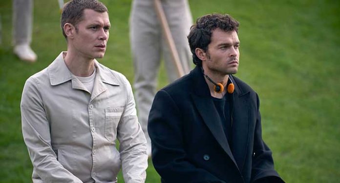 BRAVE NEW WORLD -- Episode 108 -- Pictured: (l-r) Joseph Morgan as Cjack 60/57, Alden Ehrenreich as John the Savage -- (Photo by: Steve Schofield/Peacock)