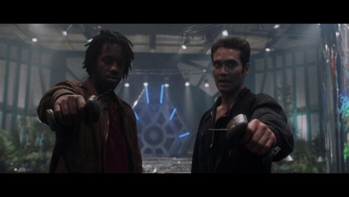 Mark Dacascos and Kadeem Hardison in Drive (1997)