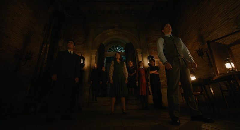 Tina Fey, Kelly Reilly, Emma Laird, Jude Hill, Riccardo Scamarcio, Camille Cottin, Nicholas Holland, Kyle Allen, Maxime S. Girard, and Ali Khan in A Haunting in Venice (2023)