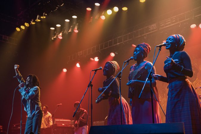 Kingsley Ben-Adir as “Bob Marley”, Anna-Sharé Blake as “Judy Mowatt”, Lashana Lynch as “Rita Marley”, and Naomi Cowan as “Marcia Griffiths” in Bob Marley: One Love from Paramount Pictures.