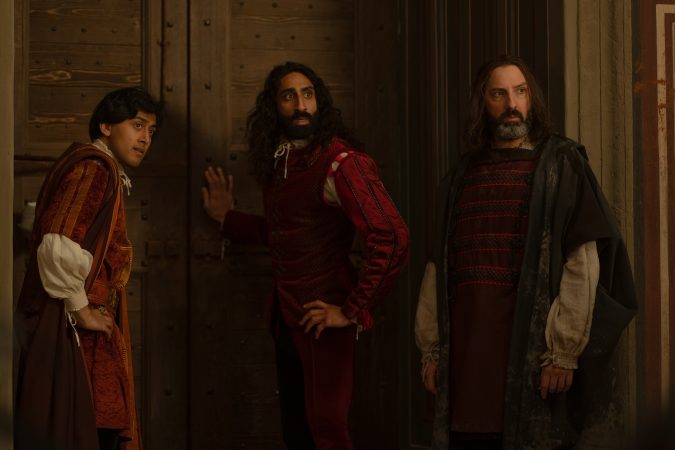 THE DECAMERON. (L to R) Karan Gill as Panfilo, Amar Chadha-Patel as Dioneo and Tony Hale as Sirisco in Episode 102 of The Decameron. Cr. Giulia Parmigiani/Netflix © 2023