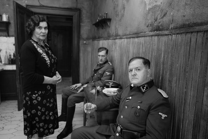 MARIA. (L to R) Lydia Koniordou as 	Litsa Callas, Philipp Droste as SS-Soldier and Jörg Westphal as SS Officer in Maria. Cr. Pablo Larraín/Netflix © 2024.