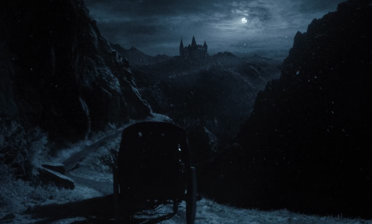 A carriage approaches Orlok’s castle in director Robert Eggers’ NOSFERATU, a Focus Features release. Credit: Courtesy of Focus Features / © 2024 FOCUS FEATURES LLC