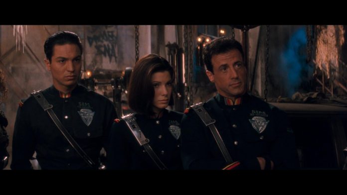 Sylvester Stallone and Sandra Bullock in Demolition Man (1993)