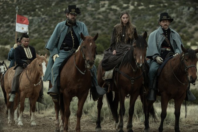 AMERICAN PRIMEVAL. (L to R) Jerimiah Bitsui as Grey Fox, Kip Weeks as Pepper, Saura Lightfoot Leon as Abish and Lucas Neff as Dellinger in Episode 104 of American Primeval. Cr. Matt Kennedy/NETFLIX © 2023