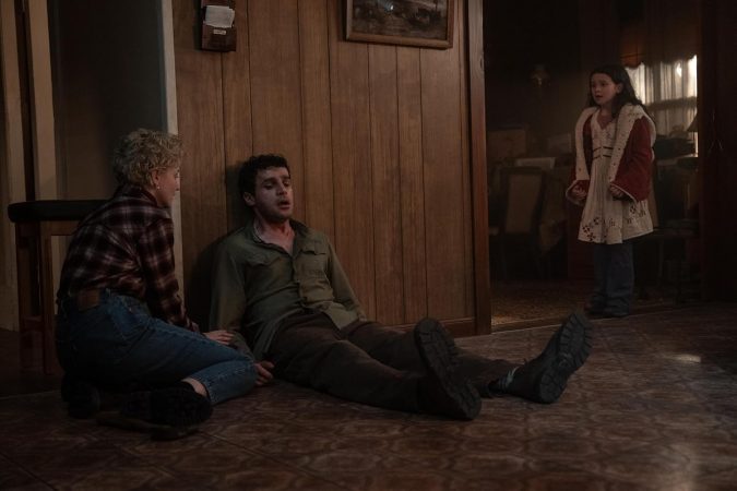 Christopher Abbott, Julia Garner, and Matilda Firth in Wolf Man (2025)