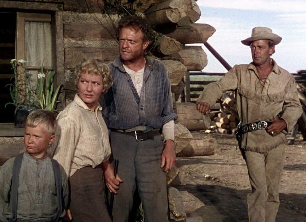 Alan Ladd, Jean Arthur, Brandon De Wilde, and Van Heflin in Shane (1953)